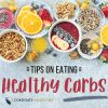 bowls of fruits, nuts, seeds with the text "tips on eating healthy carbs"