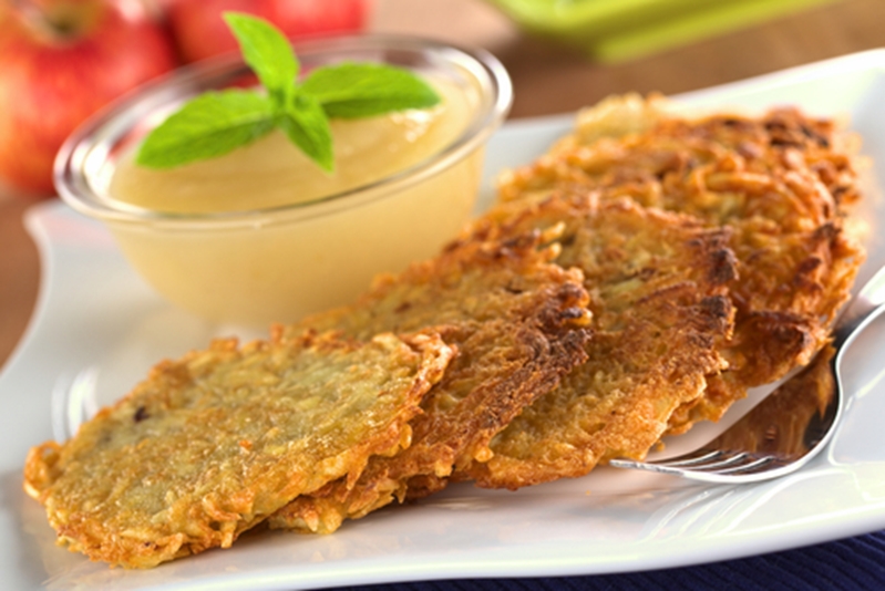 Latkes and applesauce are delicious by themselves or when eaten together. 