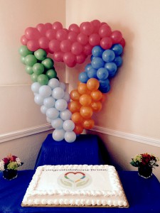 Balloons and cake for Consulate Core Values