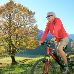 man biking in fall